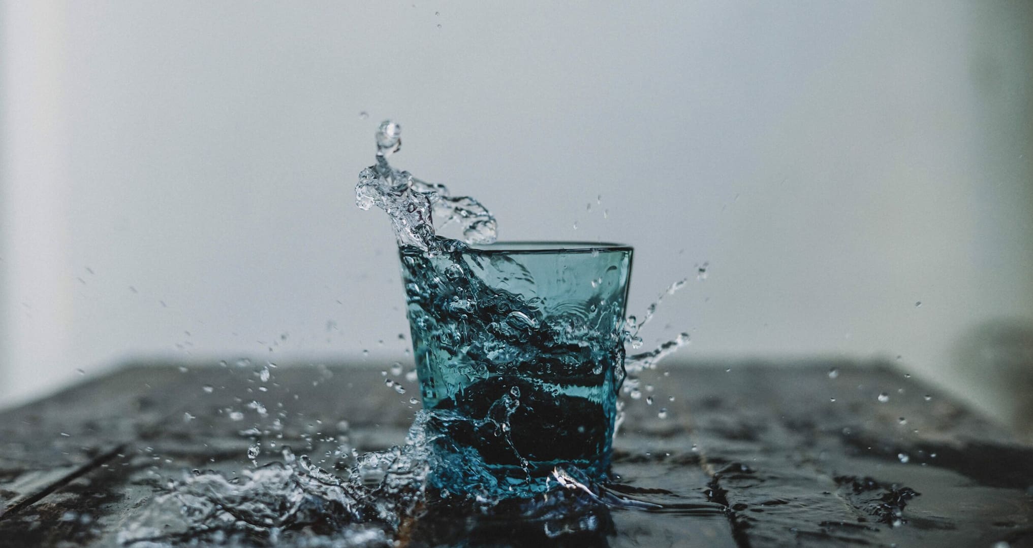 water glass splashing