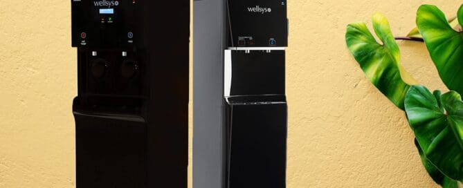 two water coolers standing side by side