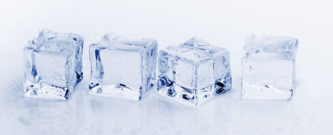 ice cubes melting on table