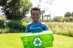 volunteers collecting plastic in park